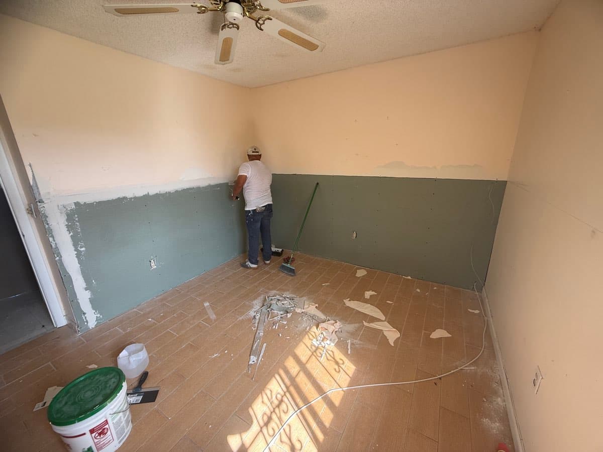 Drywall patched and compounded before interior painting in South Miami Heights