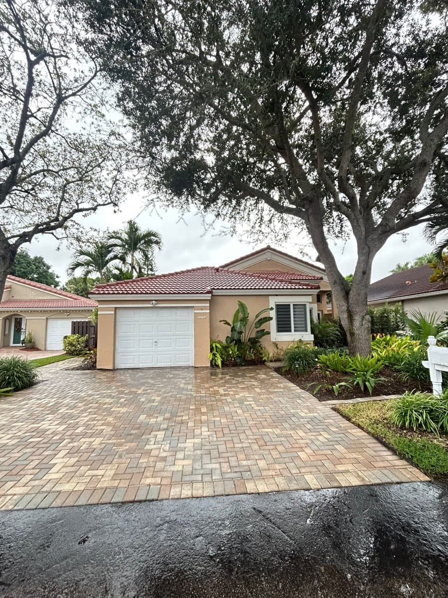 Completed driveway sealant coating for exterior home repair in Miami