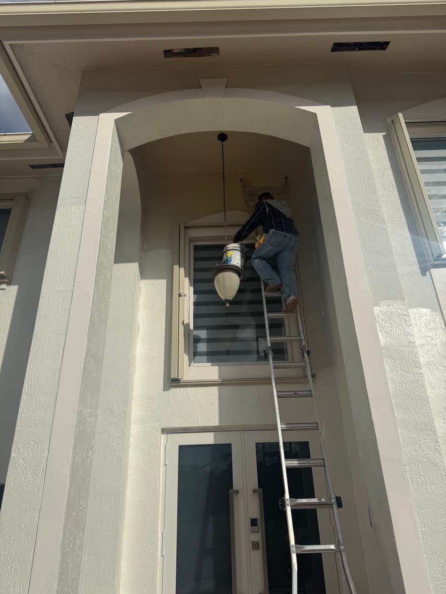 Exterior house painting tall entrance finished in The Hammocks Miami