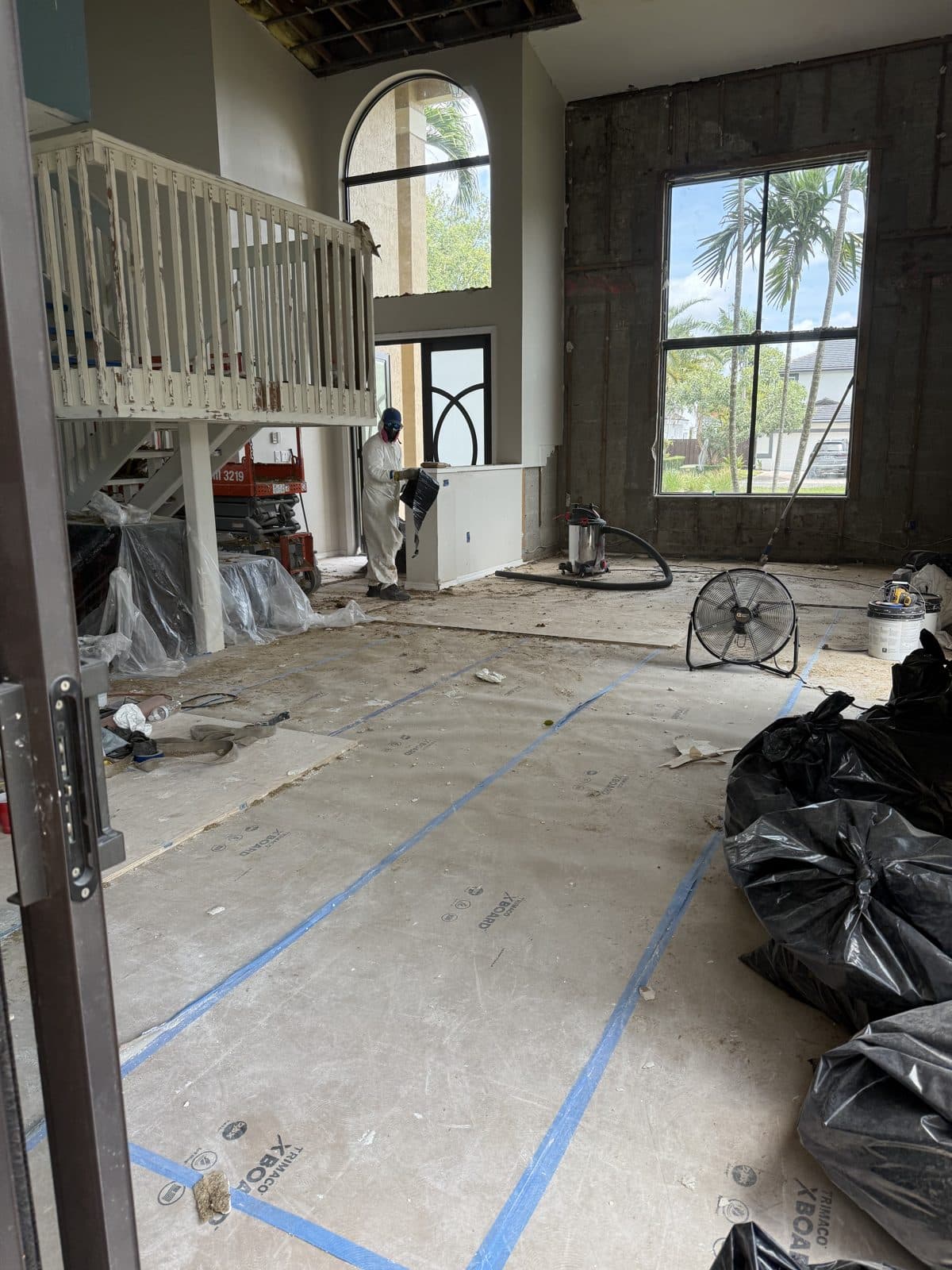 Before - Two-Story Wall Repair and Paint