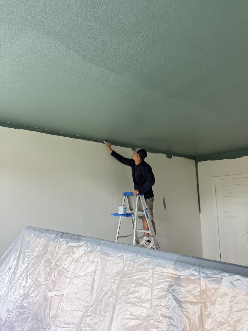 Furniture wrapped and the ceiling cut in by hand.